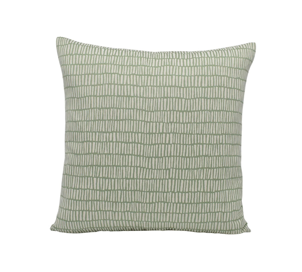 A square throw pillow with a repeating green and white striped pattern.