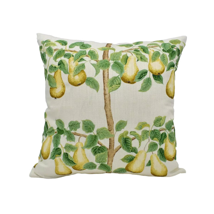 A decorative throw pillow with a tree design featuring pears hanging from its branches.