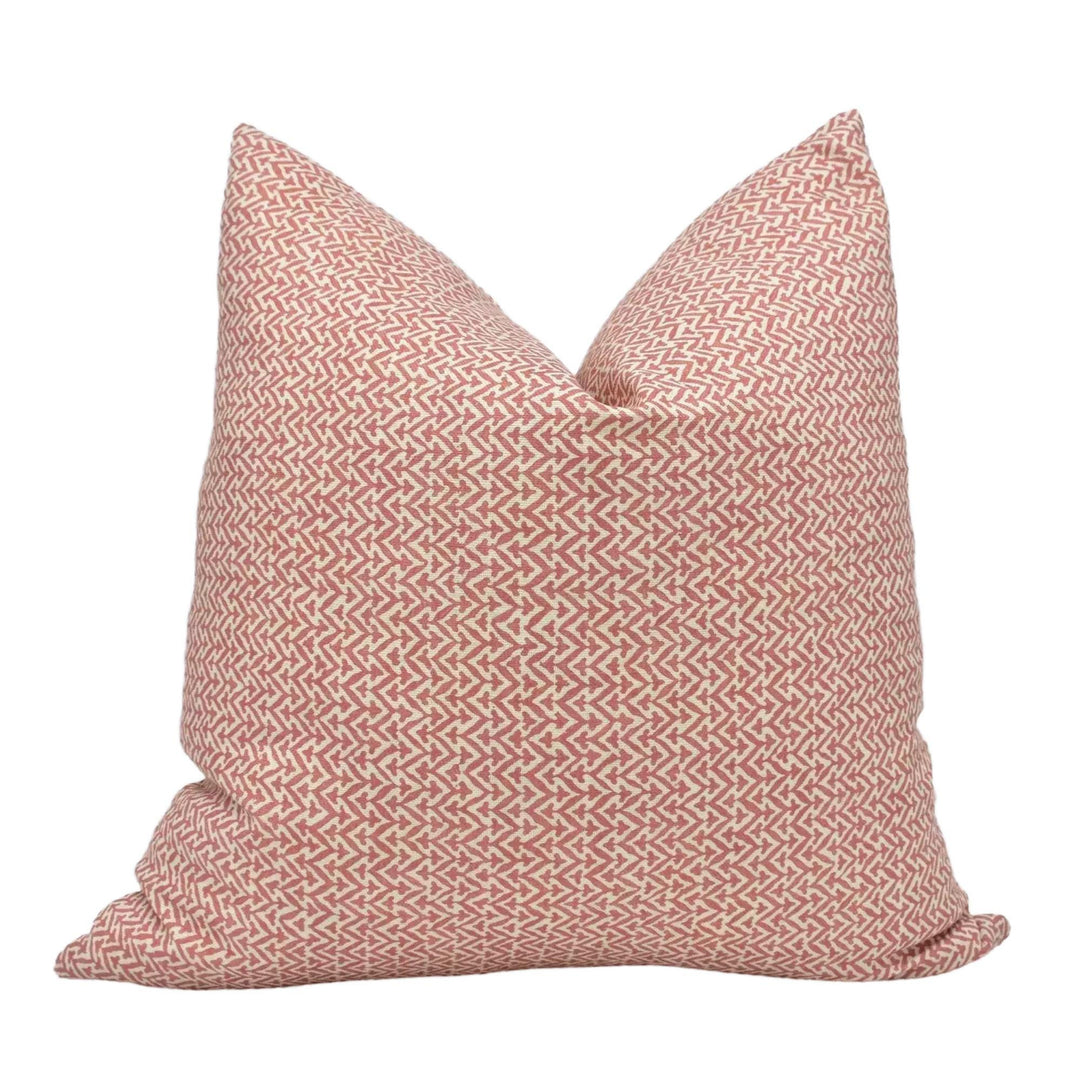 A single pillow with a pink and white zigzag pattern.