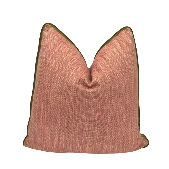 A single, orange throw pillow with a green border is displayed against a white background.