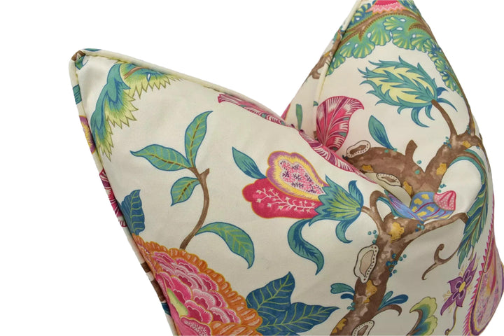 a close-up view of a decorative pillow with a vibrant, colorful floral pattern.