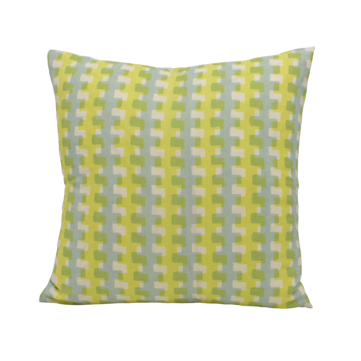 A square throw pillow with a repeating pattern of yellow and green squares.