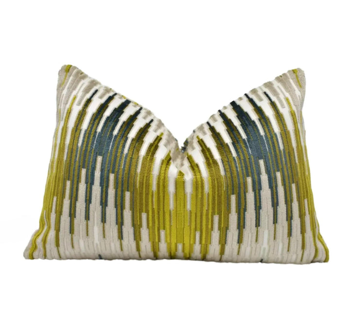 a single pillow with a vibrant, colorful design featuring vertical stripes in shades of green, yellow, and white.