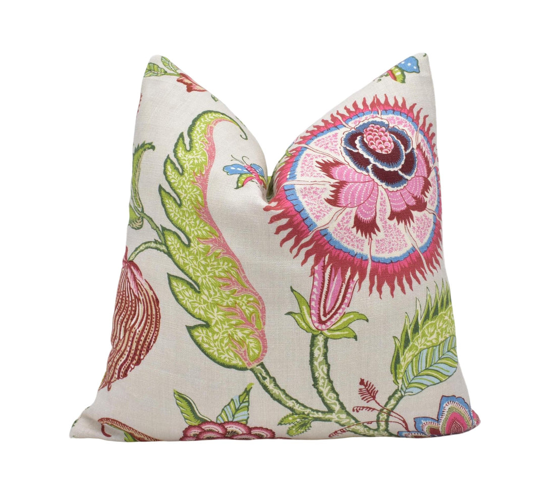 a white pillow with a colorful floral design