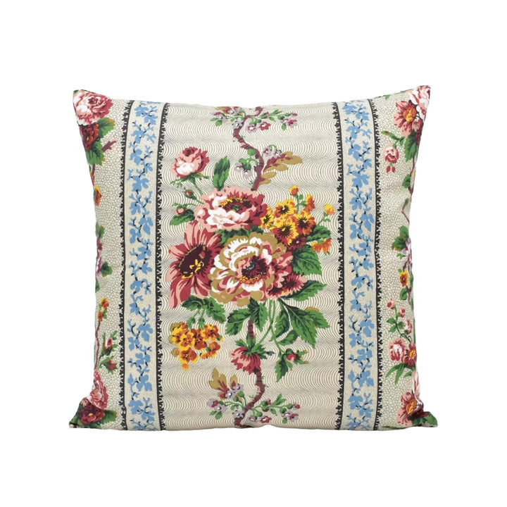 A square throw pillow with a floral print design.