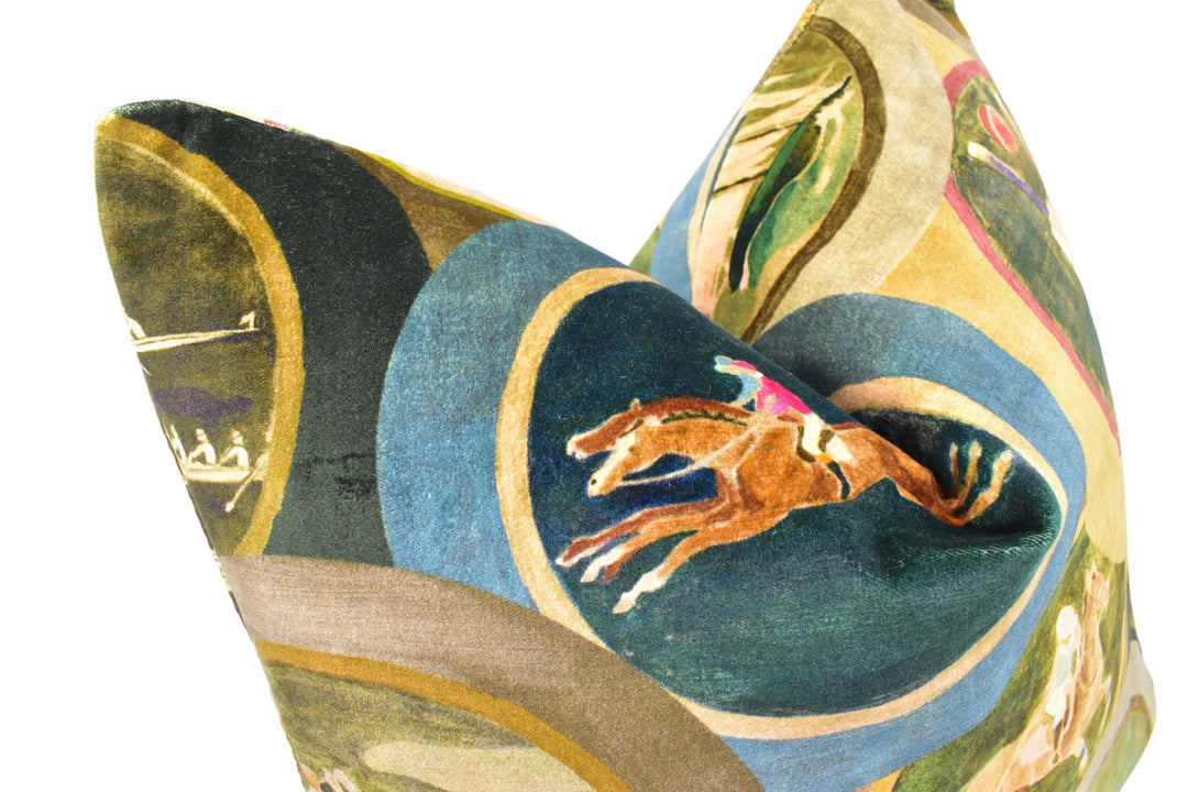 a close up of a decorative pillow with a horse on it
