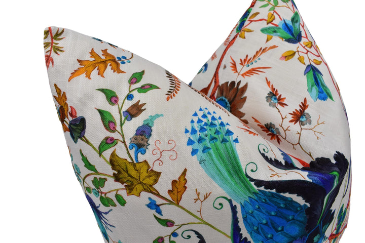 a close-up view of a decorative pillow with a vibrant, colorful floral pattern.