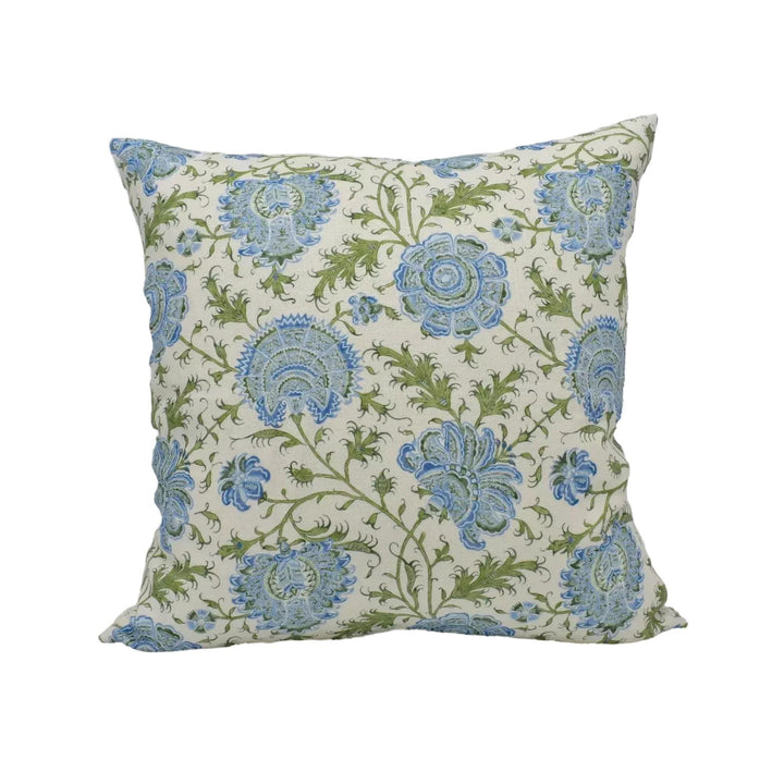 A square throw pillow with a floral pattern in shades of blue and green.