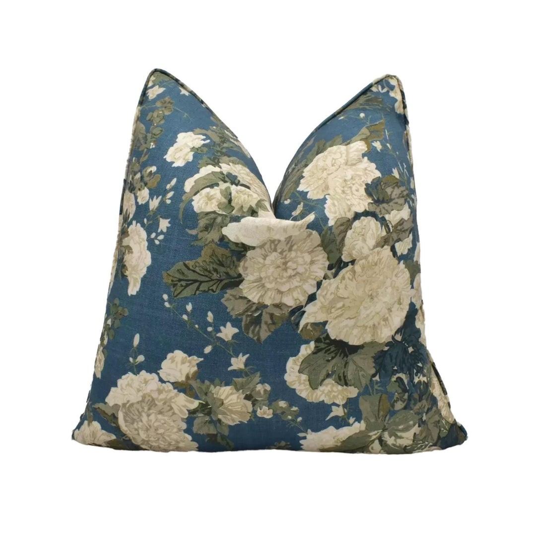 A blue and white floral patterned pillow.