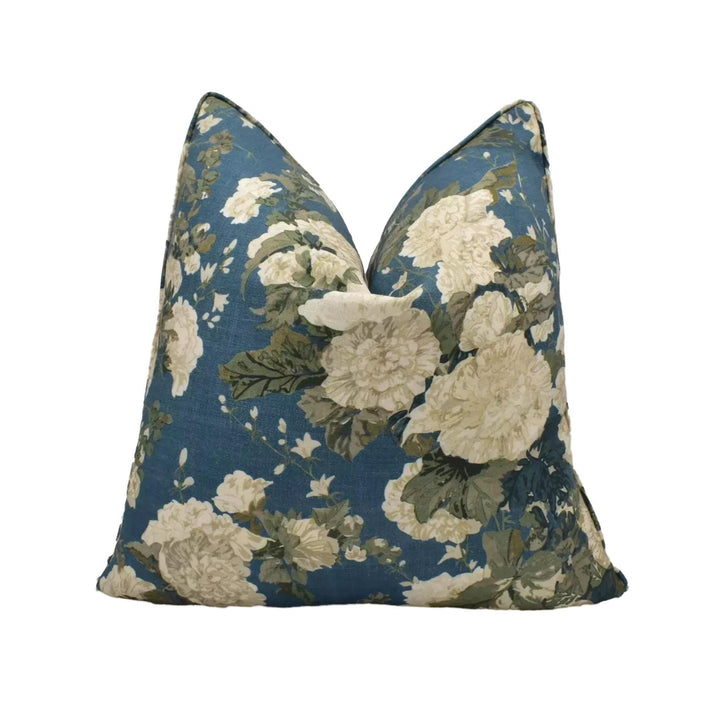 A blue and white floral patterned pillow.