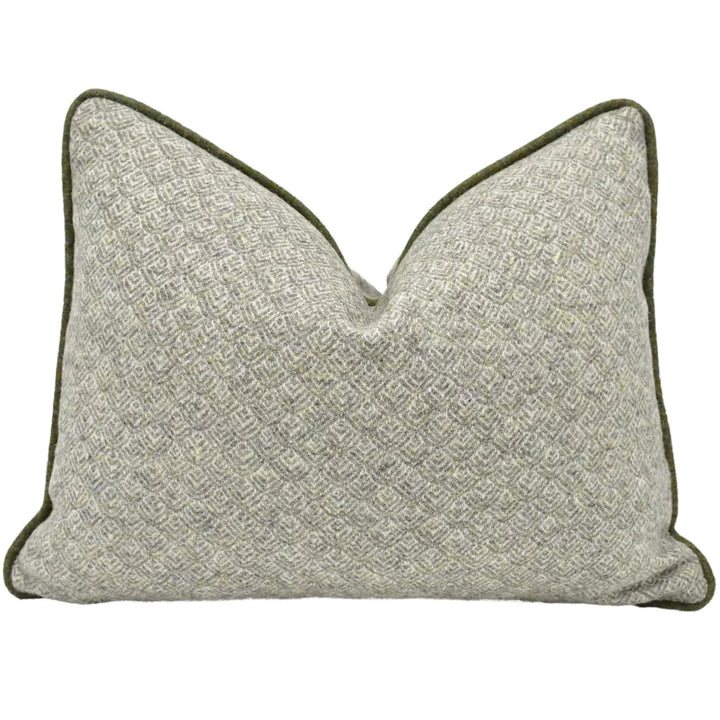 A gray and green patterned throw pillow with a textured, woven appearance.