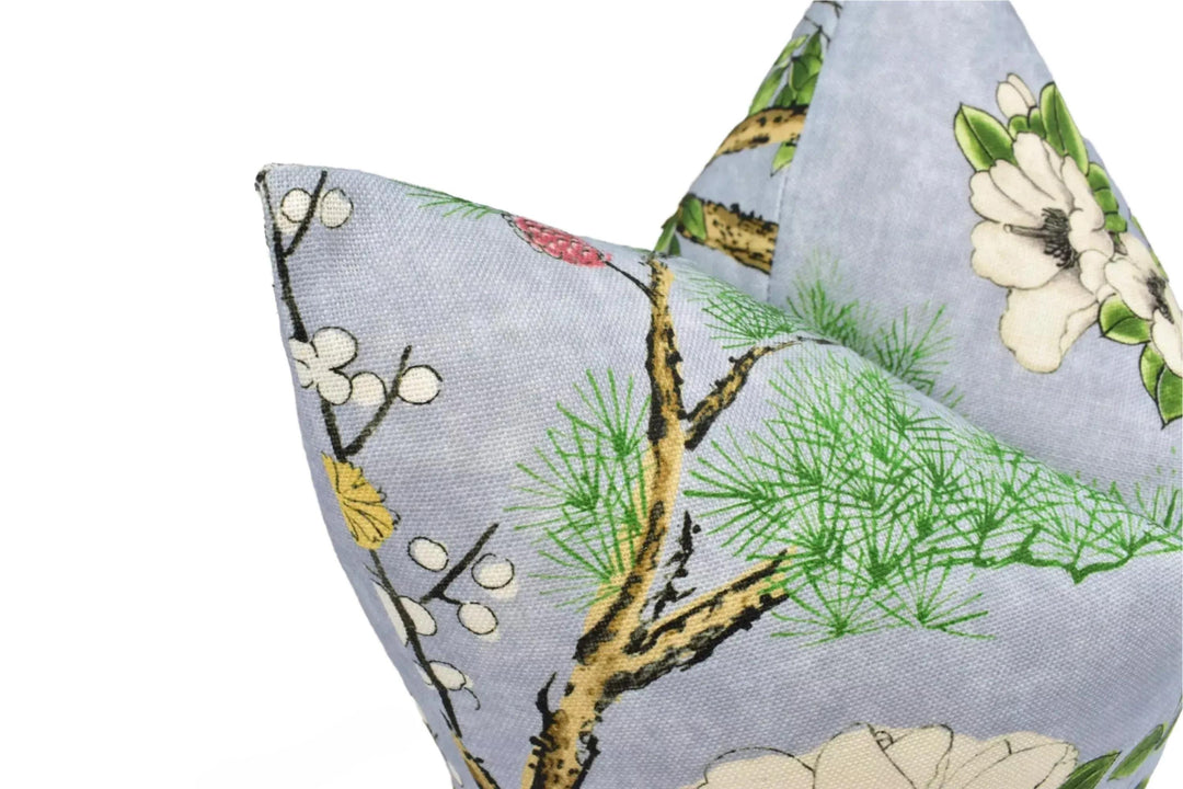 a close-up view of a decorative pillow with a floral pattern.