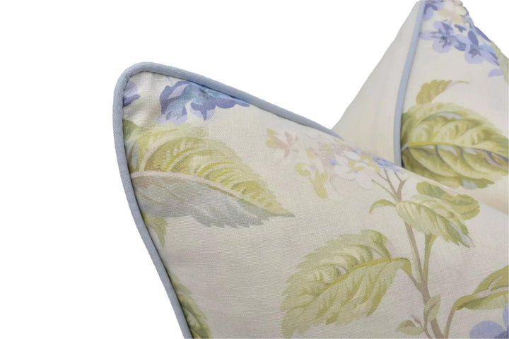a close-up view of a decorative pillow with a floral pattern.