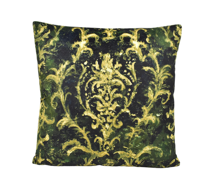 A square throw pillow with a dark green and gold floral pattern.