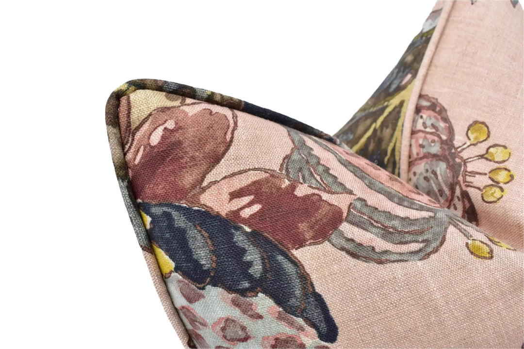 a close-up view of a decorative pillow with a floral pattern.