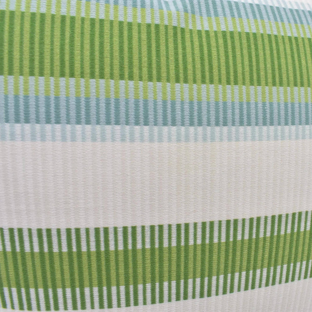 a close-up view of a fabric with a striped pattern in shades of green and white. The fabric appears to be a textile or material with a textured surface.