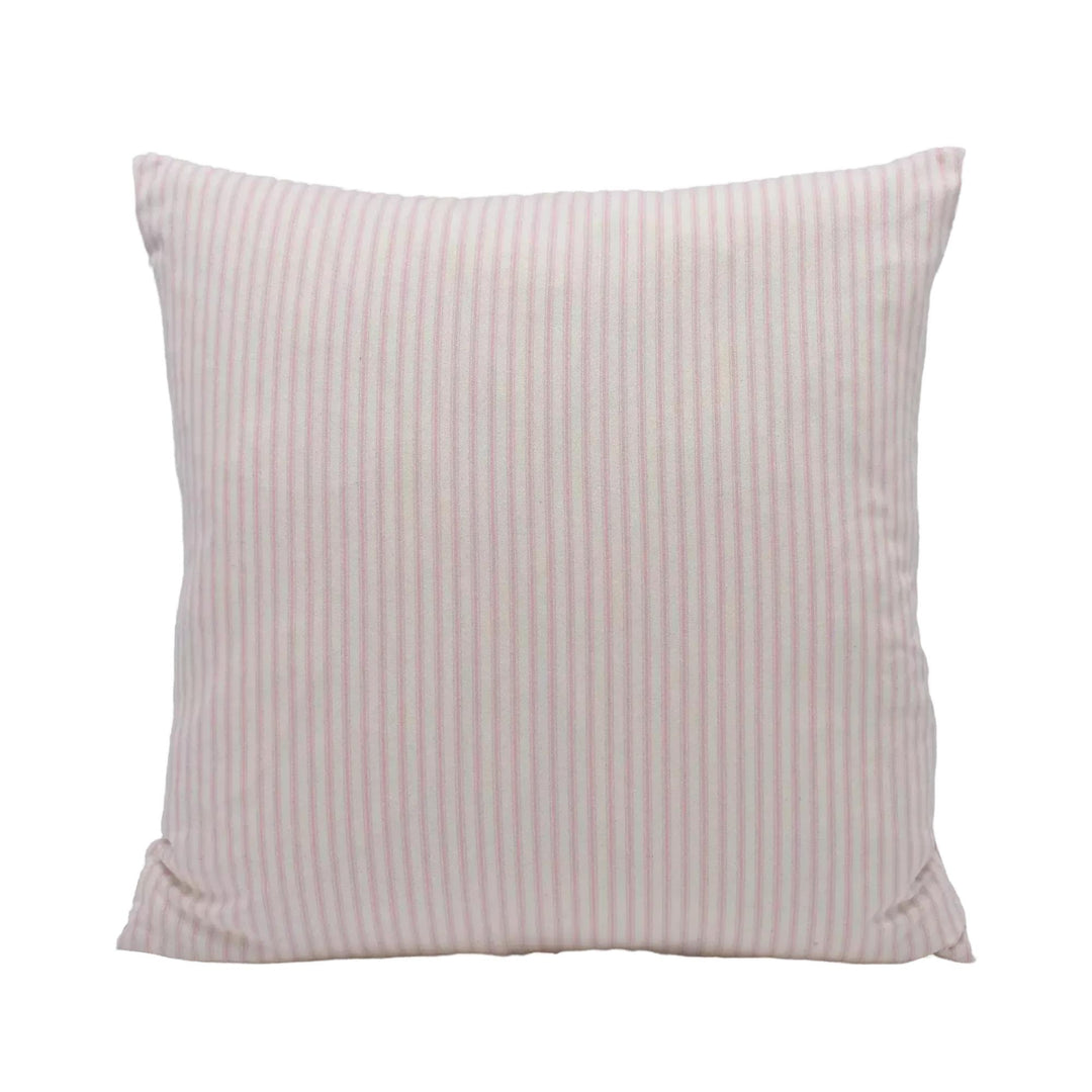A square pillow with a striped pattern in shades of pink and white.