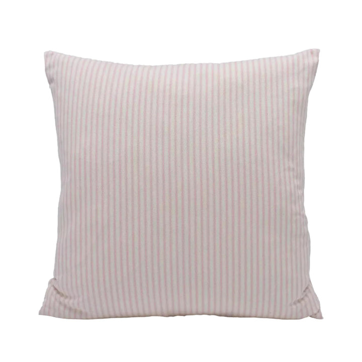 A square pillow with a striped pattern in shades of pink and white.