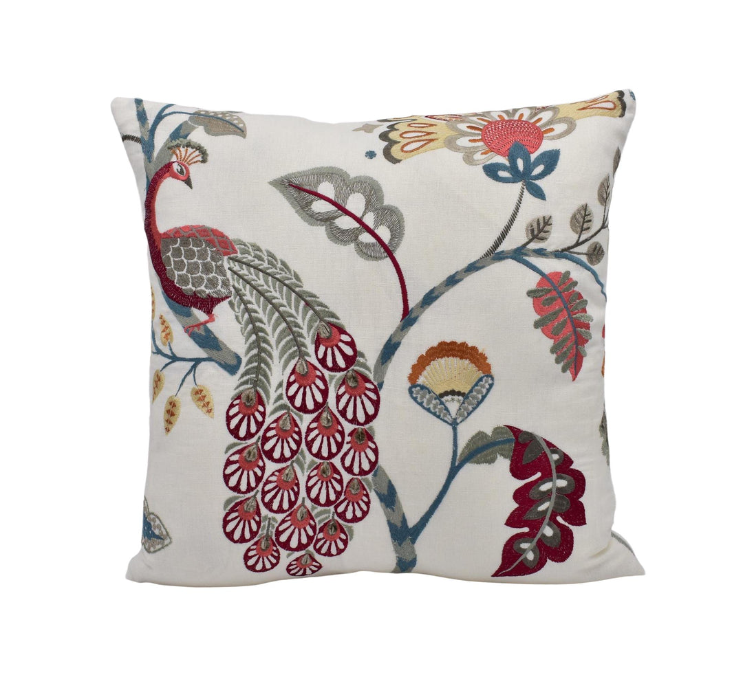 A decorative throw pillow with a floral and peacock motif, featuring a variety of colorful flowers and leaves in shades of red, green, and blue.