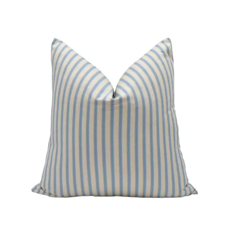 A single pillow with a striped pattern in shades of blue and white.