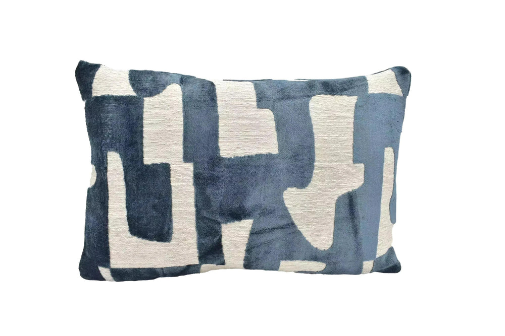 A blue and white patterned pillow is displayed against a white background.