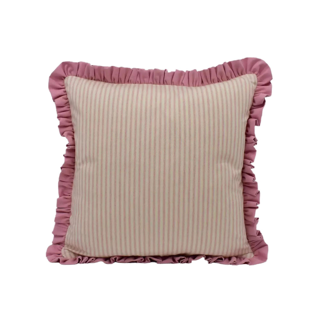 A square throw pillow with a pink and white striped pattern and a ruffled border.