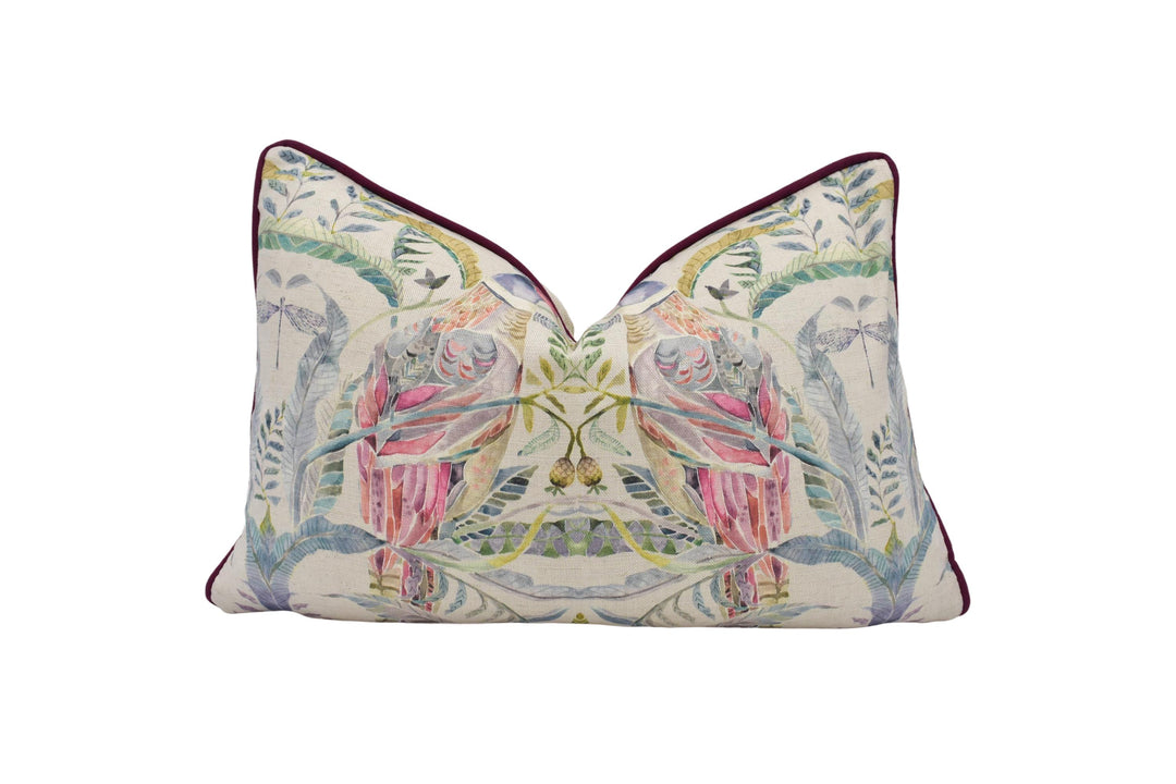 a decorative pillow with a bird design on it