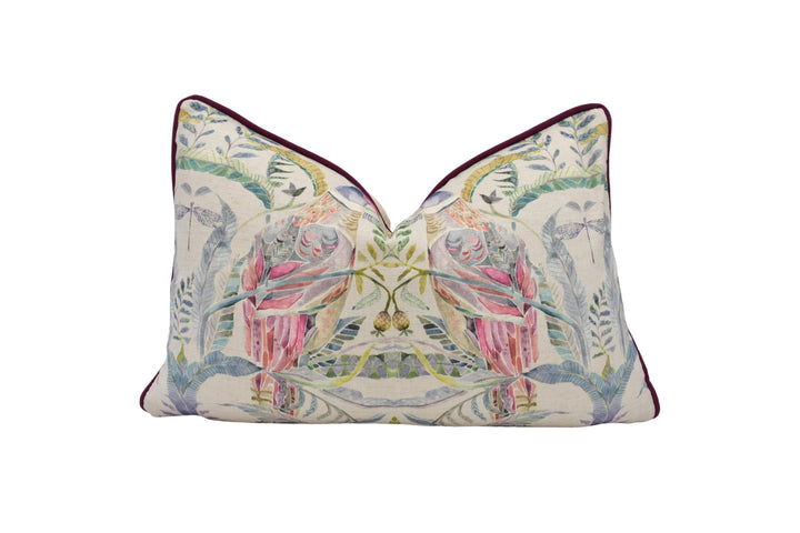 a decorative pillow with a bird design on it