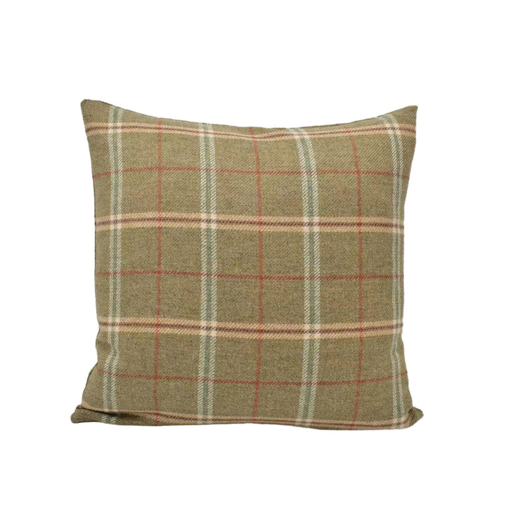 A square throw pillow with a plaid pattern in shades of green, red, and beige.
