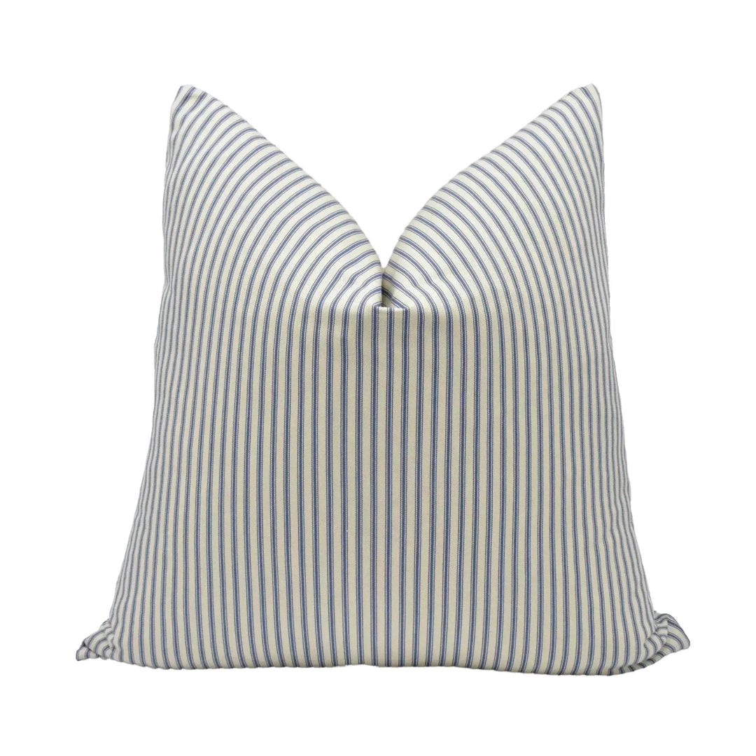 A single pillow with a striped pattern in shades of blue and white.
