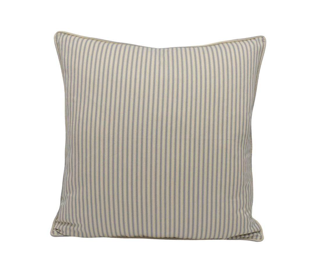 a striped pillow on a white background