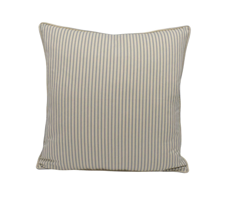 a striped pillow on a white background