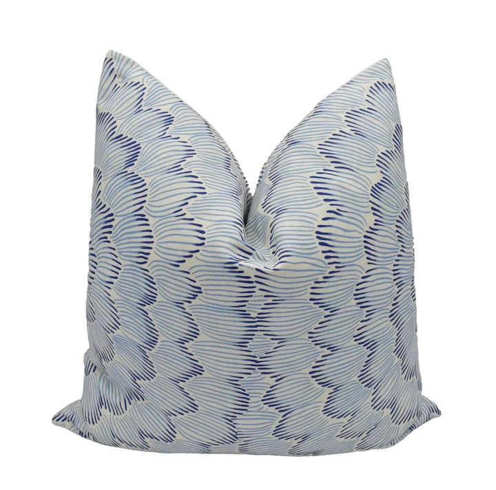 a single pillow with a blue and white striped pattern.