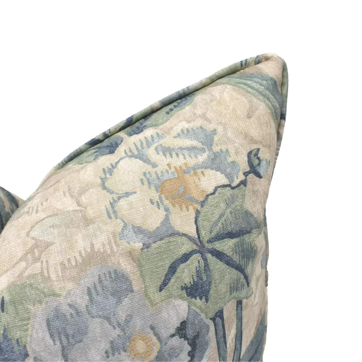 a close-up view of a decorative pillow with a floral pattern.