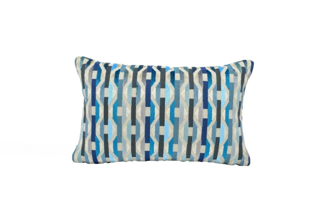 A decorative pillow with a blue and white striped pattern.