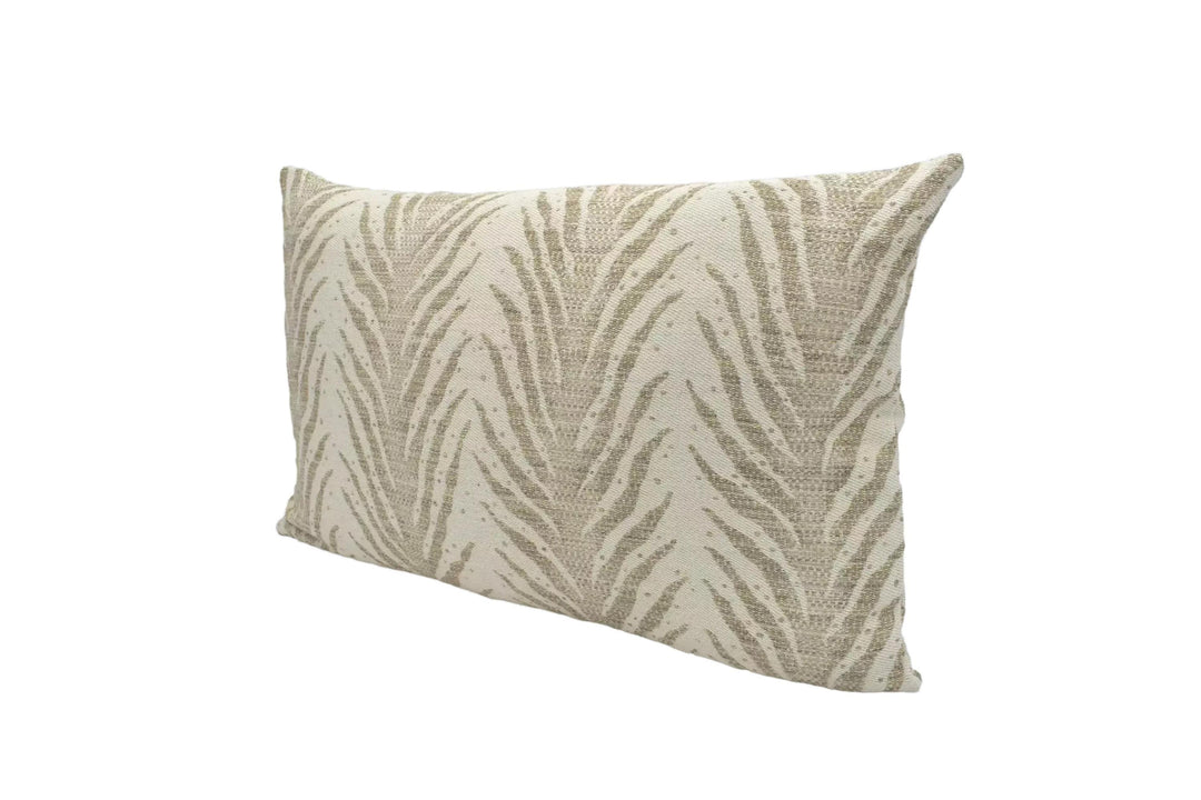 A beige and gold zebra print pillow is displayed against a white background.