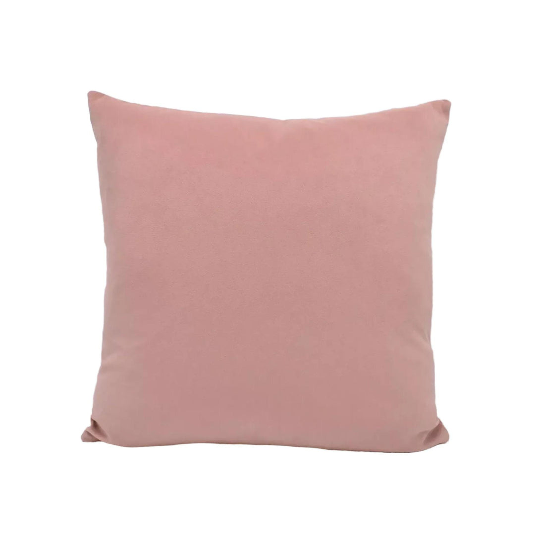 A single, square, pink velvet pillow against a white background.