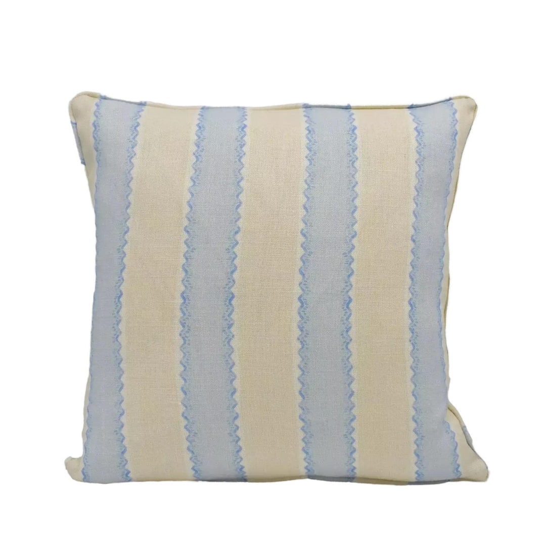 A square throw pillow with a striped pattern in shades of blue and beige.