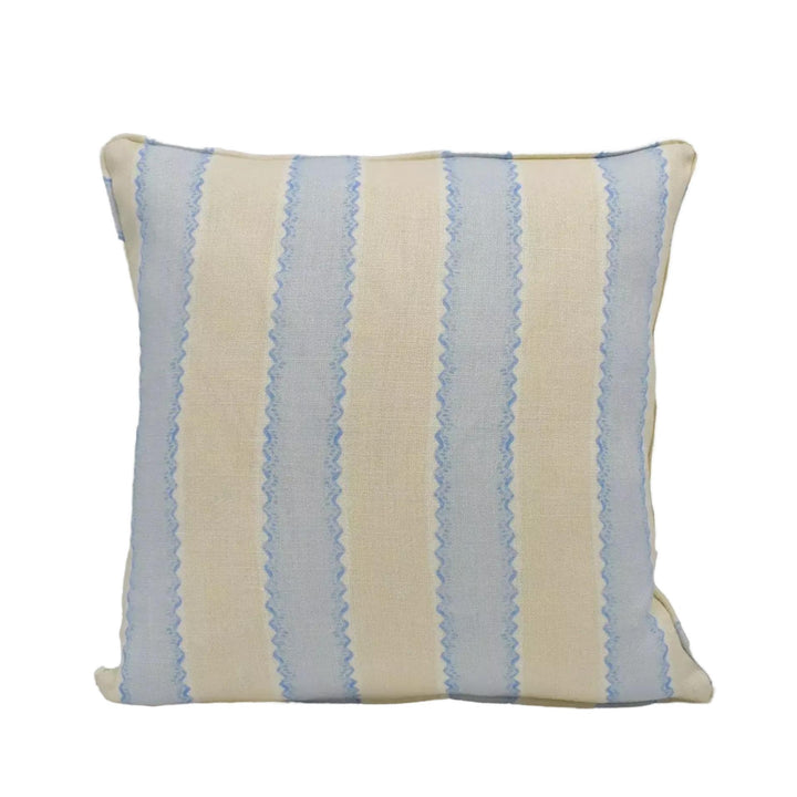 A square throw pillow with a striped pattern in shades of blue and beige.