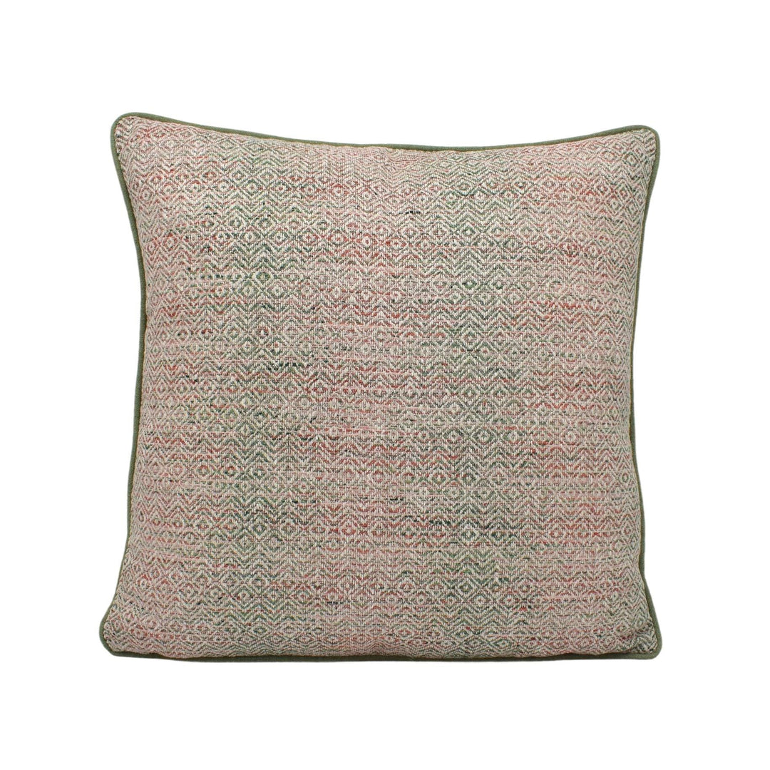 a pink and green pillow on a white background