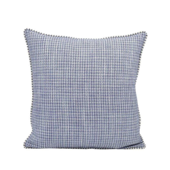 A square throw pillow with a blue and white checkered pattern.