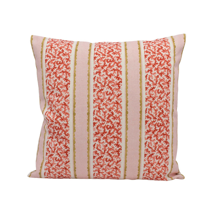 A square throw pillow with a floral pattern in shades of pink and red, featuring vertical stripes.