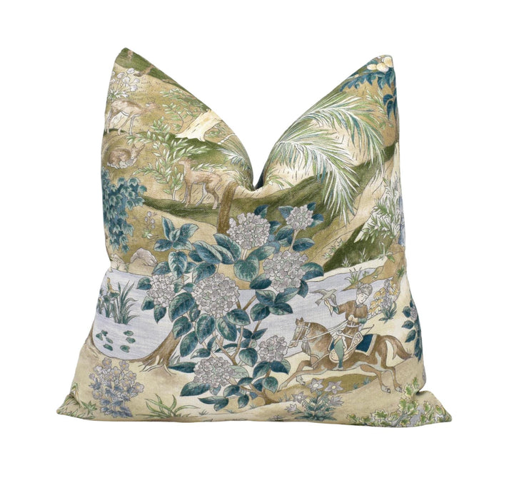 a decorative pillow with a floral and nature-inspired design.