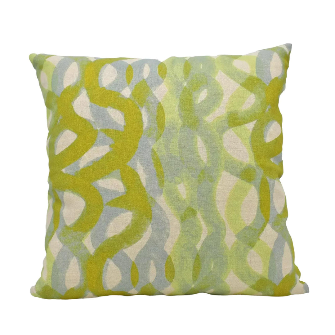 A square throw pillow with a vibrant abstract pattern in shades of green and yellow.