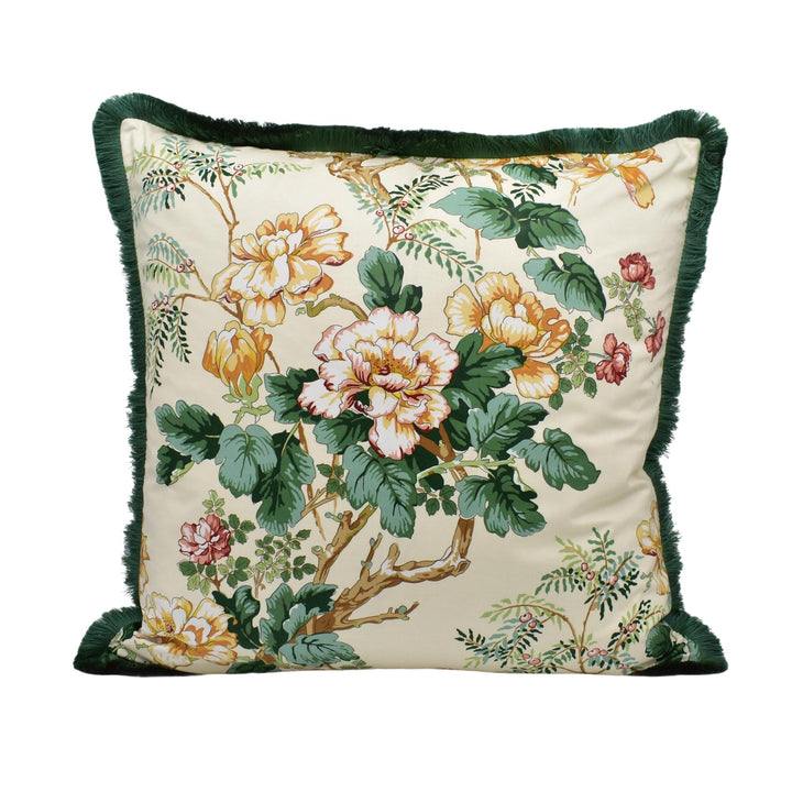 A decorative throw pillow with a floral print design on a cream-colored background.