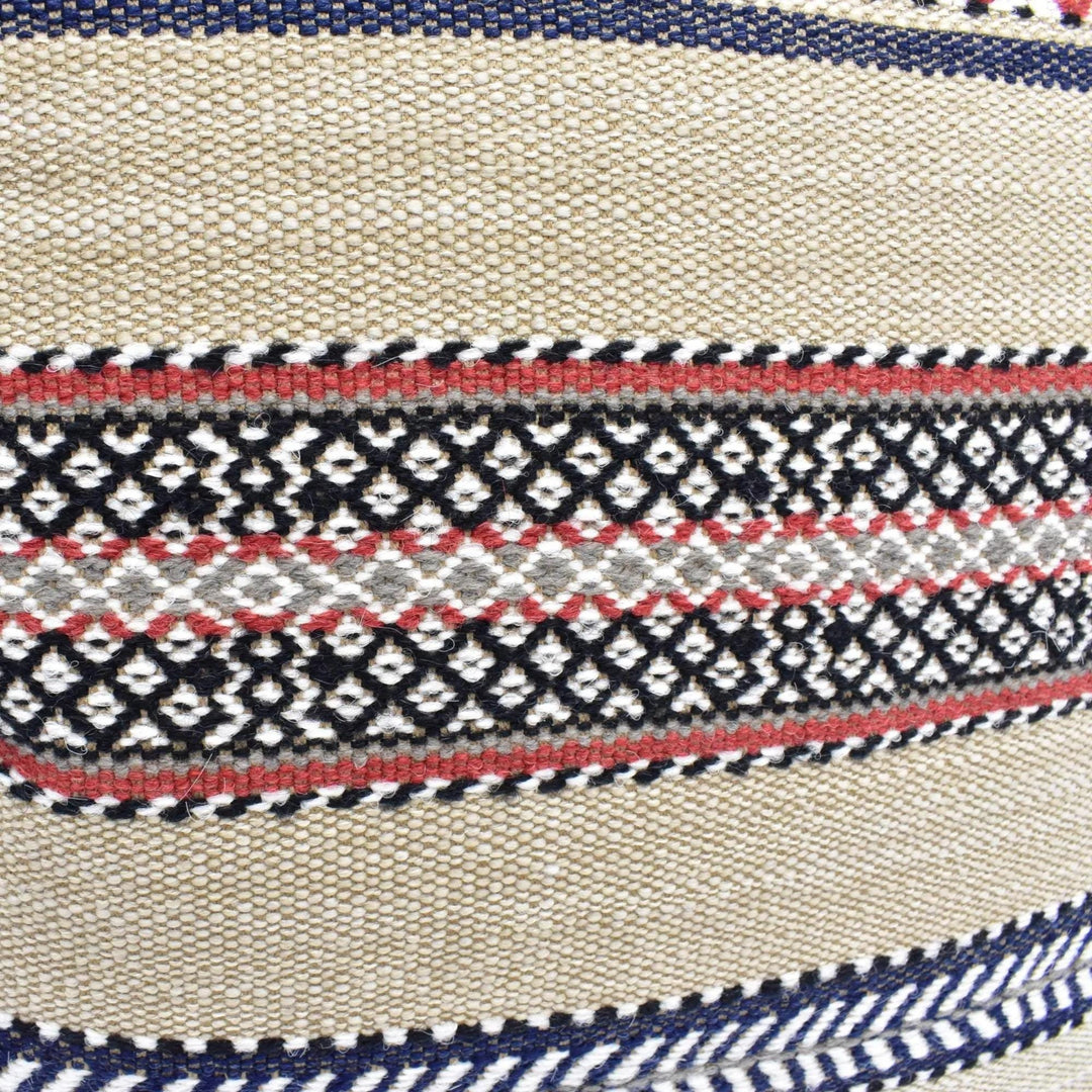 a close-up view of a woven fabric with a striped pattern in shades of beige, black, and red. The fabric appears to be made of a natural, textured material, possibly wool or cotton. The image does not contain any text or other discernible objects or actions.