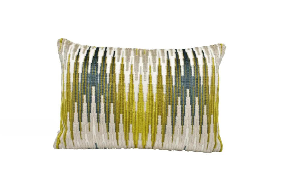 A square throw pillow with a striped pattern in shades of green, yellow, and white.