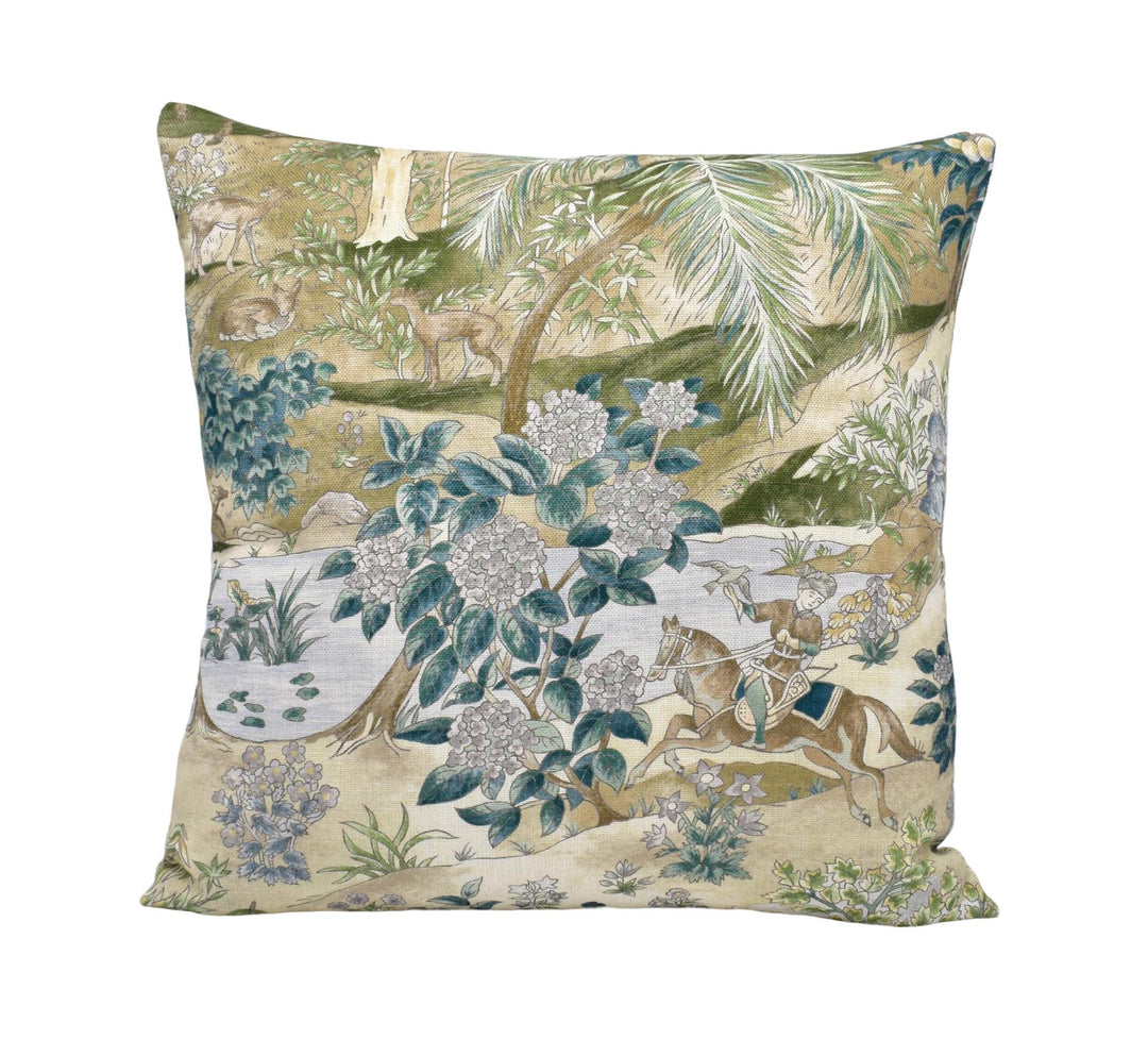 a decorative pillow with a lush, tropical landscape design. The pillow has a variety of elements, including palm trees, flowers, and animals, creating a vibrant and visually appealing scene.