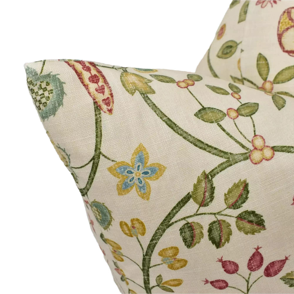 a close-up view of a decorative pillow with a floral pattern.