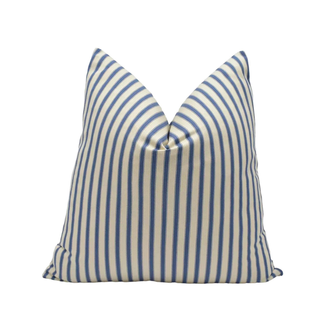 A single pillow with a striped pattern in blue and white colors.